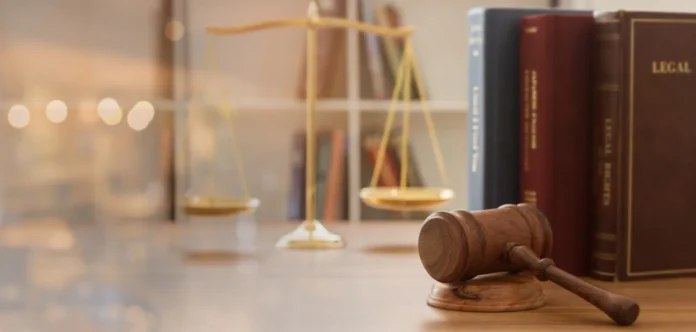 gavel-law-books-scales-1300w-GettyImages-1044578220.jpg